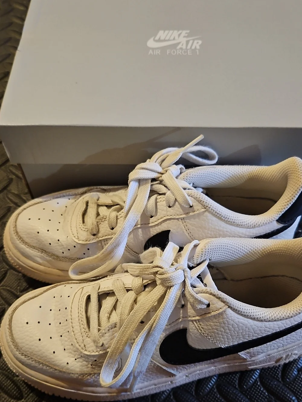 Nike White Sneakers with Black Swoosh